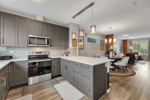 784 Livingston Hill Ne, Calgary, AB - Indoor Photo Showing Kitchen With Stainless Steel Kitchen