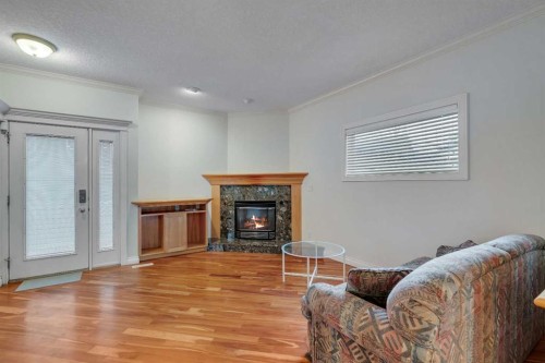 2834 Parkdale Boulevard Nw, Calgary, AB - Indoor Photo Showing Other Room With Fireplace