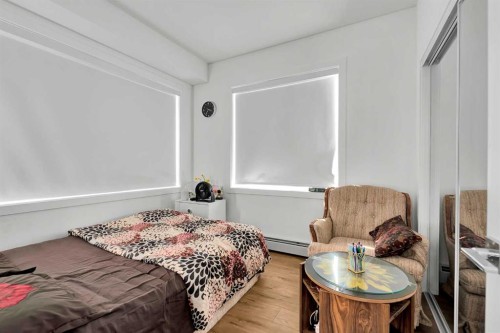 1415-111 Wolf Creek Drive Se, Calgary, AB - Indoor Photo Showing Bedroom