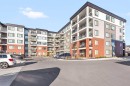 1415-111 Wolf Creek Drive Se, Calgary, AB  - Outdoor With Balcony With Facade 