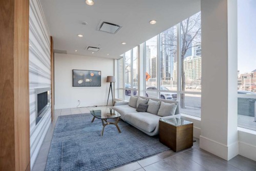 301-128 2 Street Sw, Calgary, AB - Indoor Photo Showing Other Room With Fireplace