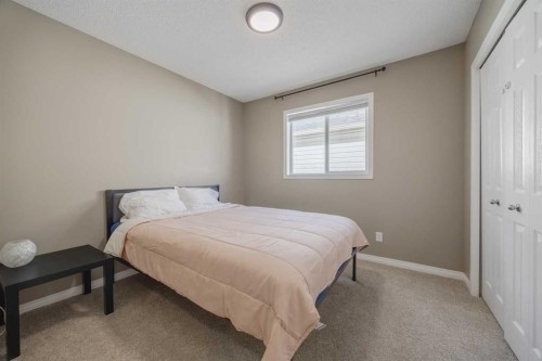 177 Silverado Range View Sw, Calgary, AB - Indoor Photo Showing Bedroom