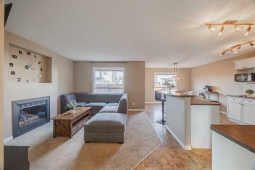 177 Silverado Range View Sw, Calgary, AB - Indoor With Fireplace