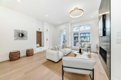214 27 Avenue Nw, Calgary, AB - Indoor Photo Showing Living Room With Fireplace