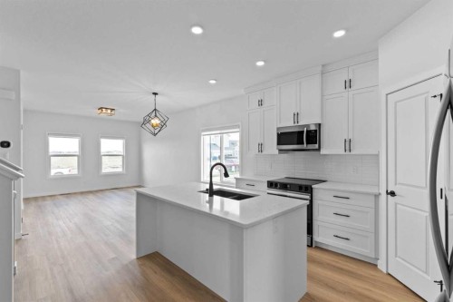 231 Vista Road, Crossfield, AB - Indoor Photo Showing Kitchen With Upgraded Kitchen