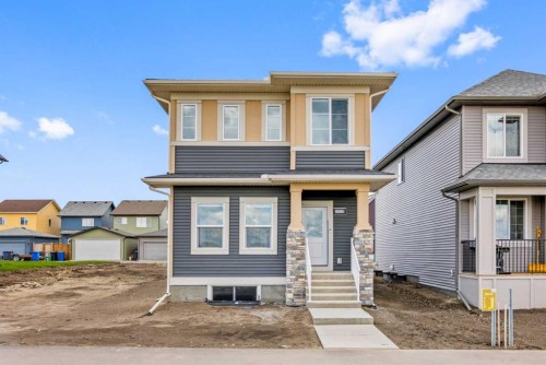 231 Vista Road, Crossfield, AB - Outdoor With Facade