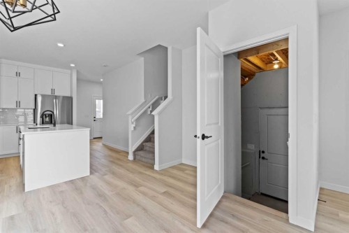 231 Vista Road, Crossfield, AB - Indoor Photo Showing Kitchen With Upgraded Kitchen