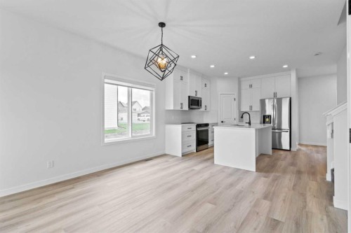 231 Vista Road, Crossfield, AB - Indoor Photo Showing Kitchen With Upgraded Kitchen