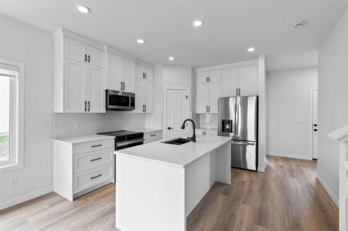 231 Vista Road, Crossfield, AB - Indoor Photo Showing Kitchen With Stainless Steel Kitchen With Upgraded Kitchen