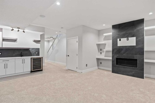 720 15 Street Nw, Calgary, AB - Indoor With Fireplace