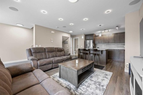 722 Redstone View Ne, Calgary, AB - Indoor Photo Showing Living Room