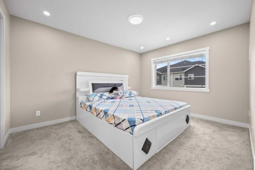 722 Redstone View Ne, Calgary, AB - Indoor Photo Showing Bedroom