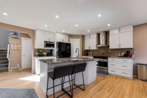 182 Tuscany Ravine Road Nw, Calgary, AB - Indoor Photo Showing Kitchen With Stainless Steel Kitchen