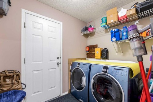 182 Tuscany Ravine Road Nw, Calgary, AB - Indoor Photo Showing Laundry Room