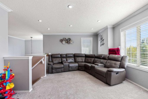 182 Tuscany Ravine Road Nw, Calgary, AB - Indoor Photo Showing Living Room