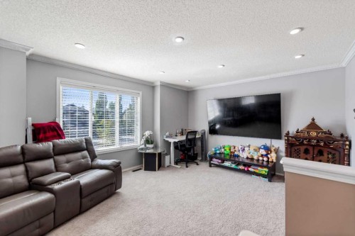 182 Tuscany Ravine Road Nw, Calgary, AB - Indoor Photo Showing Living Room