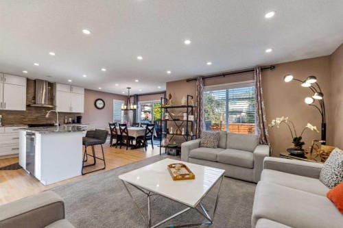 182 Tuscany Ravine Road Nw, Calgary, AB - Indoor Photo Showing Living Room
