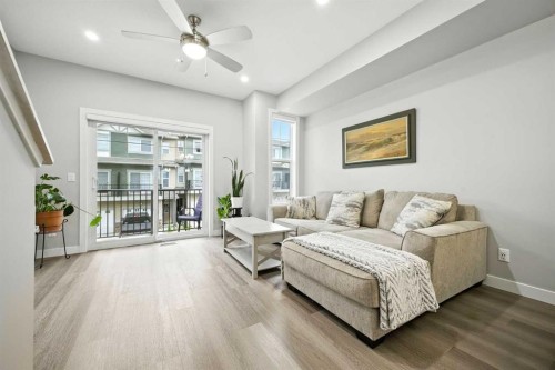 908 Sage Hill Grove Nw, Calgary, AB - Indoor Photo Showing Living Room