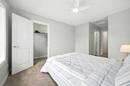 908 Sage Hill Grove Nw, Calgary, AB - Indoor Photo Showing Bedroom