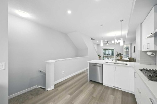908 Sage Hill Grove Nw, Calgary, AB - Indoor Photo Showing Kitchen With Double Sink With Upgraded Kitchen
