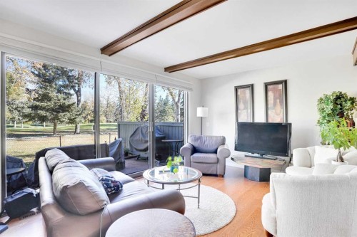 27-10910 Bonaventure Drive Se, Calgary, AB - Indoor Photo Showing Living Room