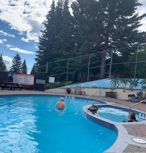 27-10910 Bonaventure Drive Se, Calgary, AB - Outdoor With In Ground Pool