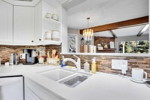 27-10910 Bonaventure Drive Se, Calgary, AB - Indoor Photo Showing Kitchen With Double Sink