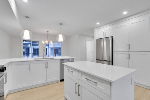 186 Belmont Street Sw, Calgary, AB - Indoor Photo Showing Kitchen With Upgraded Kitchen