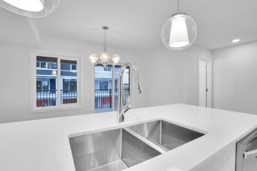 186 Belmont Street Sw, Calgary, AB - Indoor Photo Showing Kitchen With Double Sink