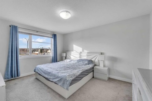10 Midtown Boulevard Sw, Airdrie, AB - Indoor Photo Showing Bedroom