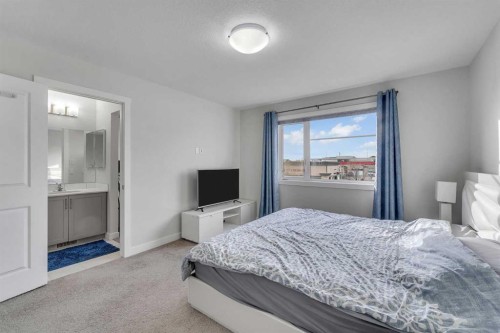 10 Midtown Boulevard Sw, Airdrie, AB - Indoor Photo Showing Bedroom