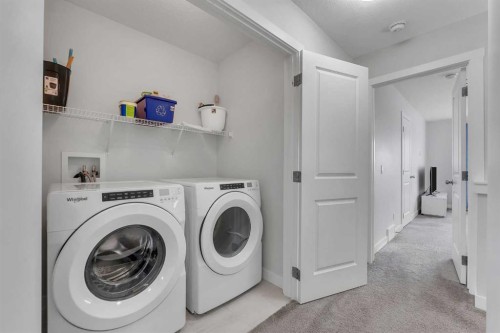 10 Midtown Boulevard Sw, Airdrie, AB - Indoor Photo Showing Laundry Room