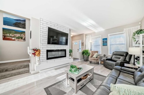 1362 Legacy Circle Se, Calgary, AB - Indoor Photo Showing Living Room With Fireplace