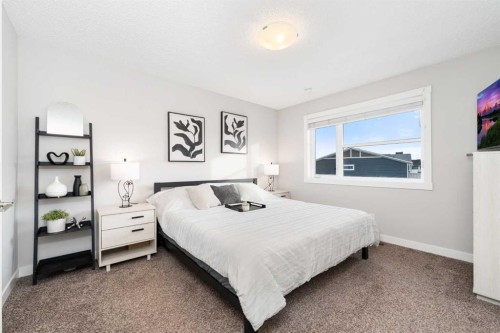 174 Seton Grove Se, Calgary, AB - Indoor Photo Showing Bedroom