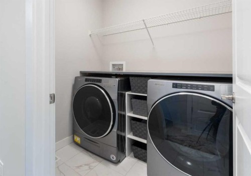 174 Seton Grove Se, Calgary, AB - Indoor Photo Showing Laundry Room