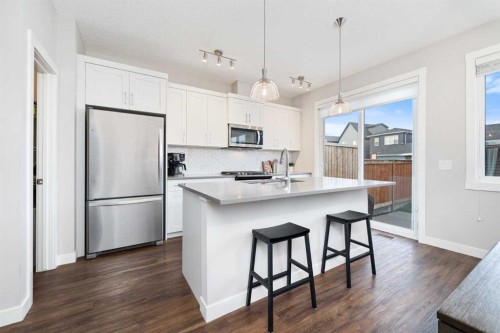 174 Seton Grove Se, Calgary, AB - Indoor Photo Showing Kitchen With Upgraded Kitchen