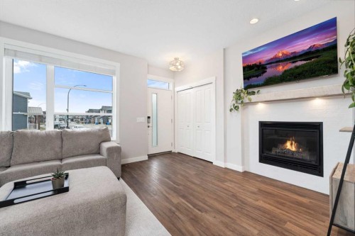 174 Seton Grove Se, Calgary, AB - Indoor Photo Showing Living Room With Fireplace