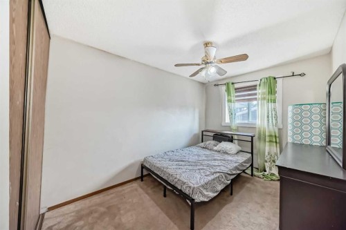 11 Martinwood Road Ne, Calgary, AB - Indoor Photo Showing Bedroom