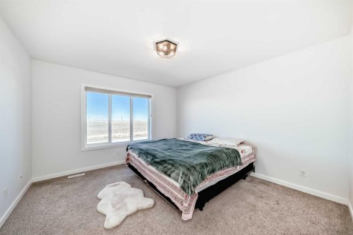 82 Magnolia Court Se, Calgary, AB - Indoor Photo Showing Bedroom