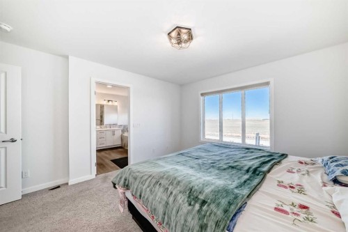 82 Magnolia Court Se, Calgary, AB - Indoor Photo Showing Bedroom