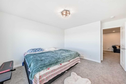 82 Magnolia Court Se, Calgary, AB - Indoor Photo Showing Bedroom