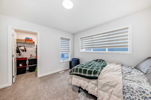 82 Magnolia Court Se, Calgary, AB - Indoor Photo Showing Bedroom
