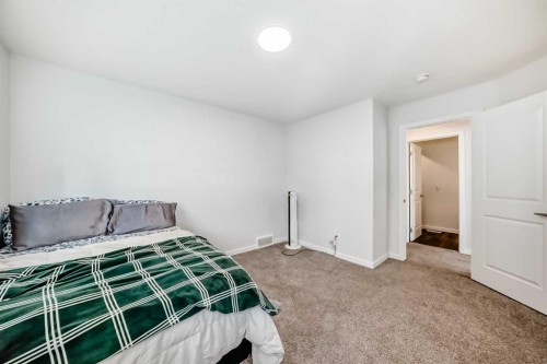 82 Magnolia Court Se, Calgary, AB - Indoor Photo Showing Bedroom