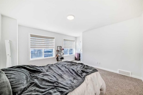 82 Magnolia Court Se, Calgary, AB - Indoor Photo Showing Bedroom
