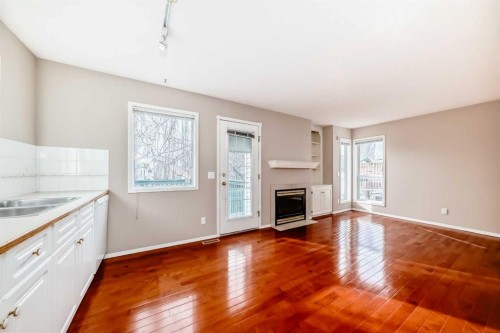 83 Harvest Gold Circle Ne, Calgary, AB - Indoor With Fireplace