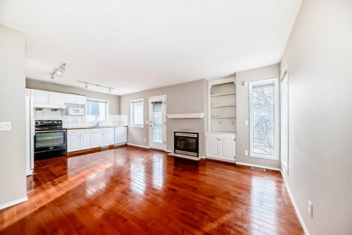 83 Harvest Gold Circle Ne, Calgary, AB - Indoor With Fireplace