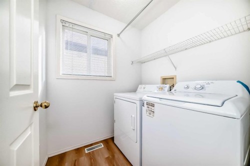 83 Harvest Gold Circle Ne, Calgary, AB - Indoor Photo Showing Laundry Room