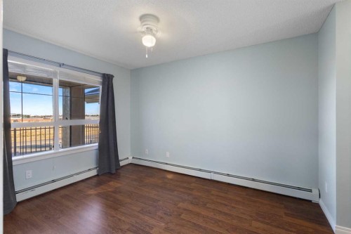 213-5115 Richard Road Sw, Calgary, AB - Indoor Photo Showing Other Room
