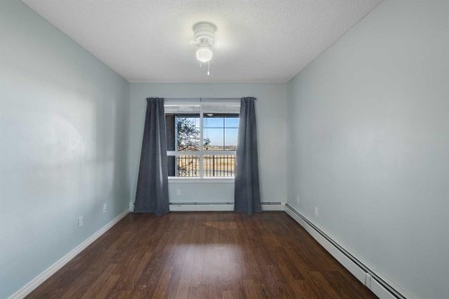 213-5115 Richard Road Sw, Calgary, AB - Indoor Photo Showing Other Room