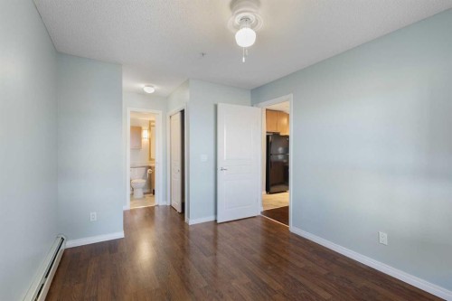 213-5115 Richard Road Sw, Calgary, AB - Indoor Photo Showing Other Room